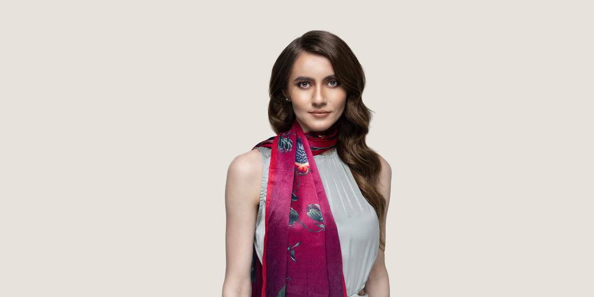 A stylish scarf for women made from sustainable fabrics like Bemberg, orange peel, or lotus stems.